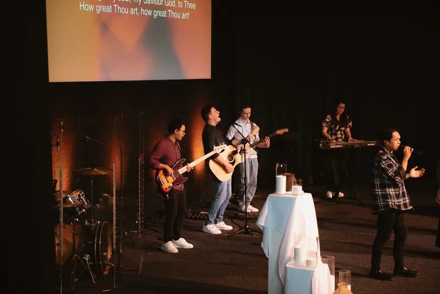 People enjoying fellowship at Ev Church Auckland
